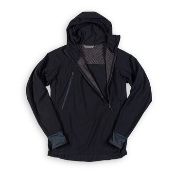 Beringia Octa Anorak in Black, zipper open, showing the insulation.