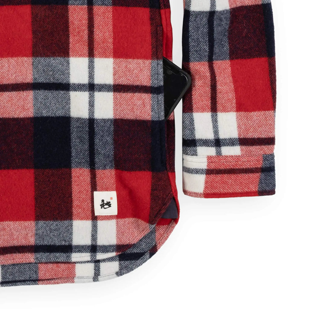 Beringia Farallon Wool Shirt - Red and Blue Plaid close up with phone in hand pocket