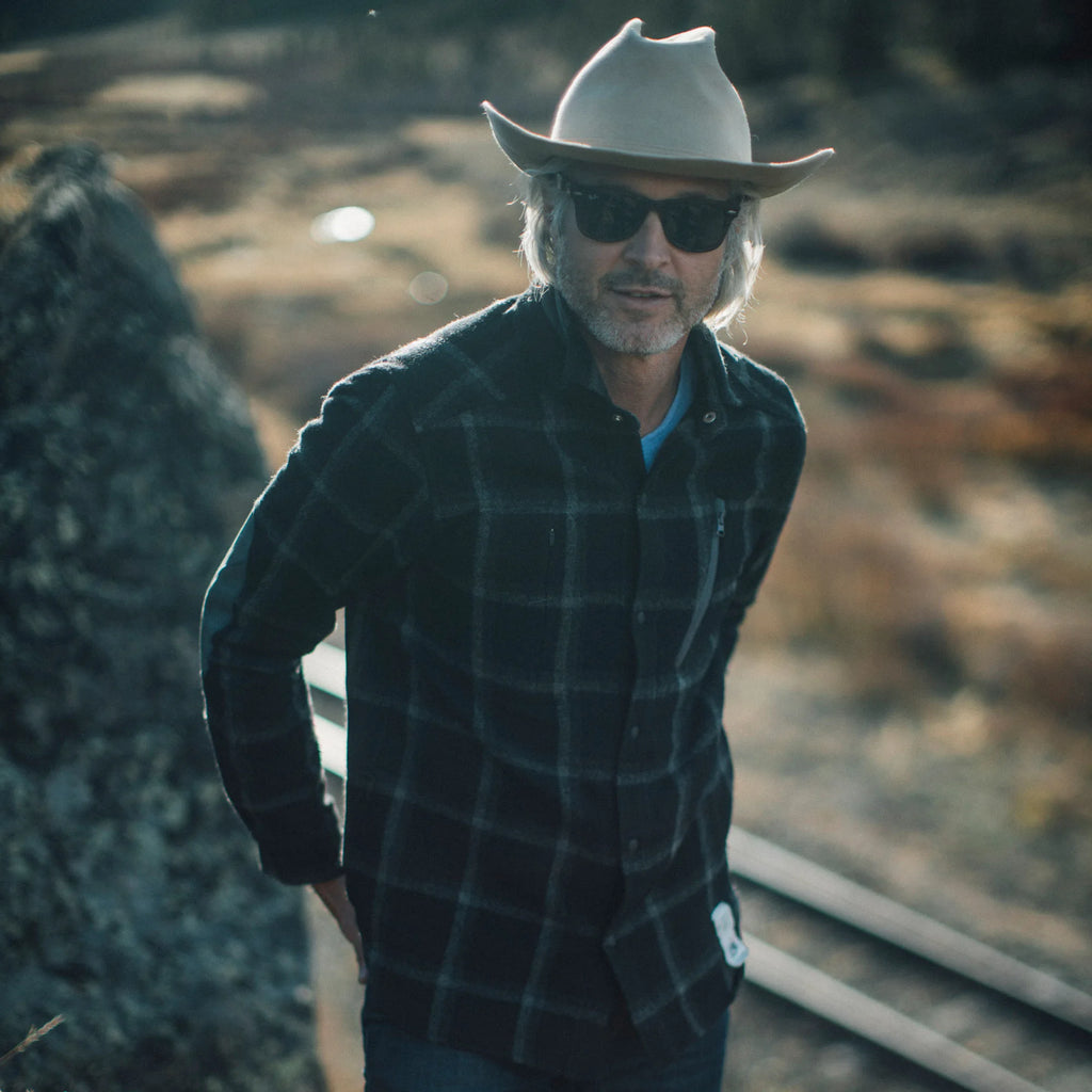 Beringia Farallon Shirt - Black Plaid, on a person